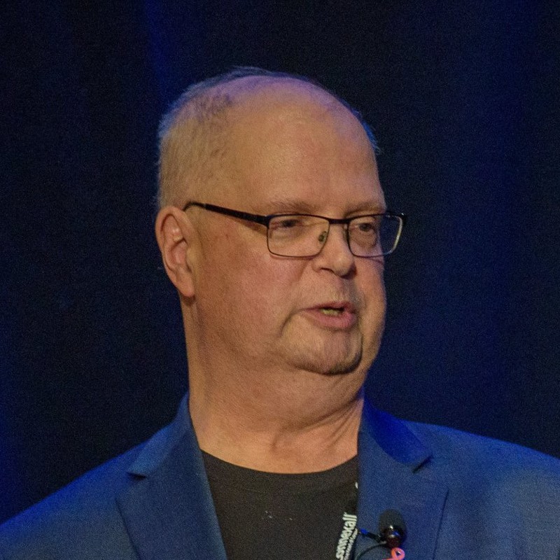 Mike Martineau speaking at a health informatics conference