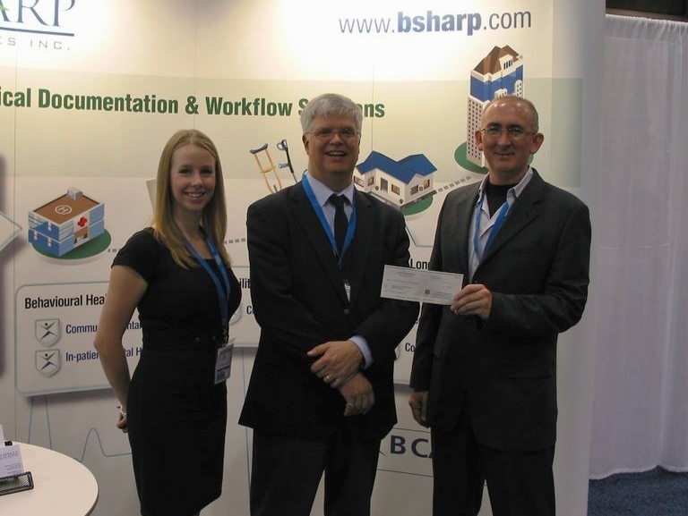 Mike Martineau at the B Sharp Technologies booth at a health IT trade show